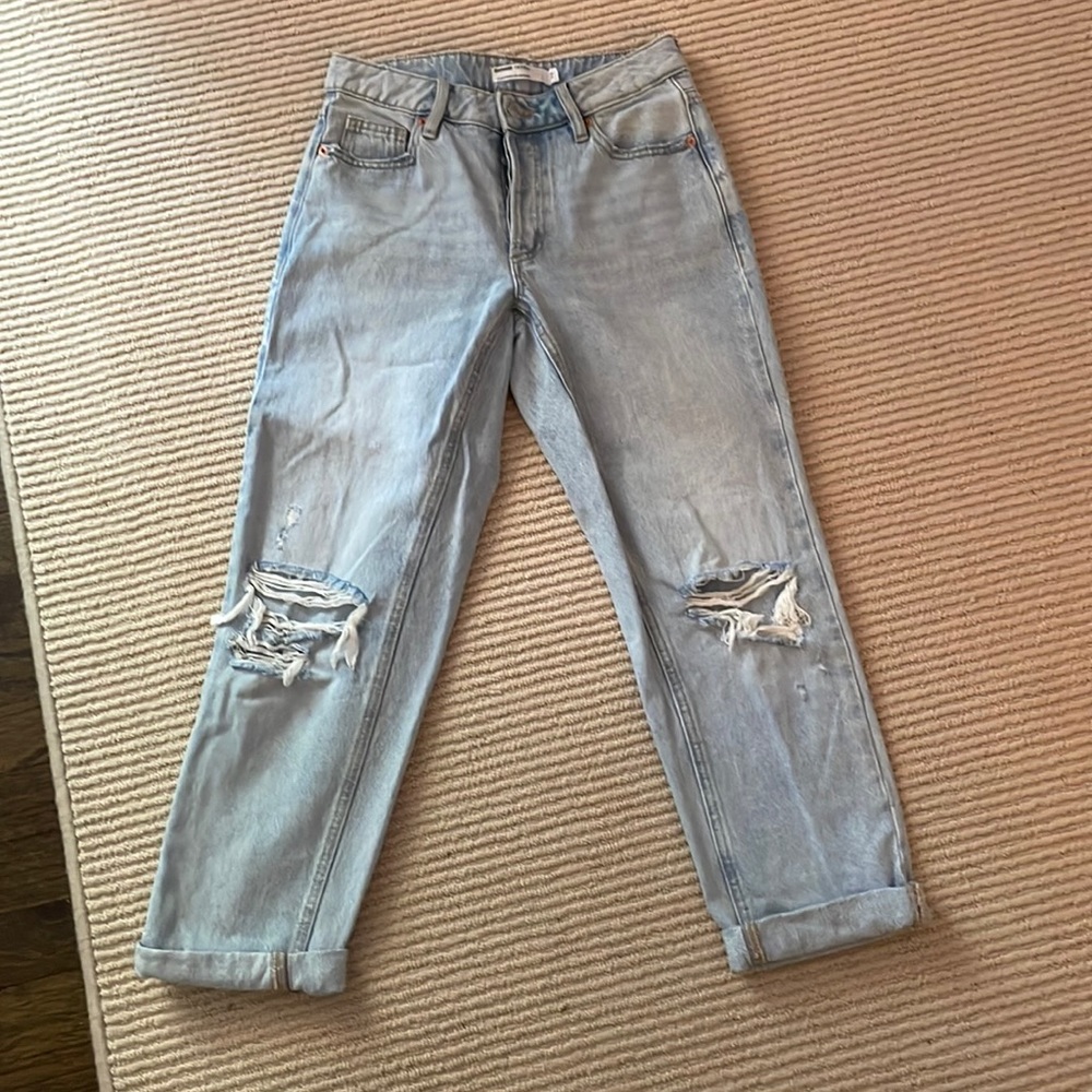 Garage ripped blue jeans. Ex-boyfriend cut—size 24